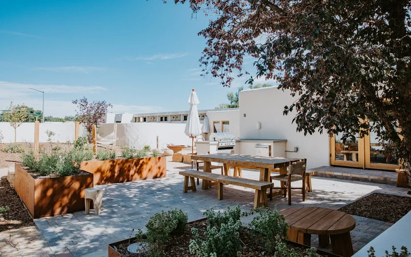 Outdoor pool and heated spa at Hotel Willa, a base for the Taos hot springs in New Mexico