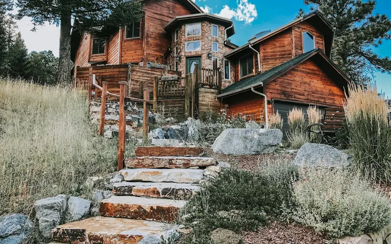 Treehouse lodging at Juniper Lodge in Evergreen, a drive from the Idaho Springs hot springs in Colorado