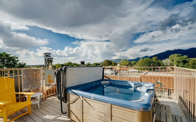 Adobe guest room at La Doña Luz Inn off the Plaza, a base for the Taos hot springs in New Mexico