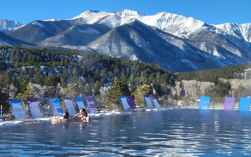 Creekside geothermal pools and lodge buildings at Mount Princeton Hot Springs Resort, the main hot springs resort near Buena Vista, Colorado